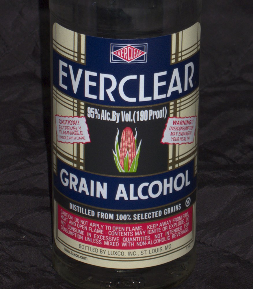 Close-up of the older Everclear 190-proof label with the red flame warning strip along the bottom of the front